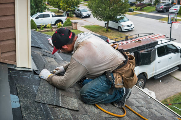 Professional Roofing technician working in Doucette, TX